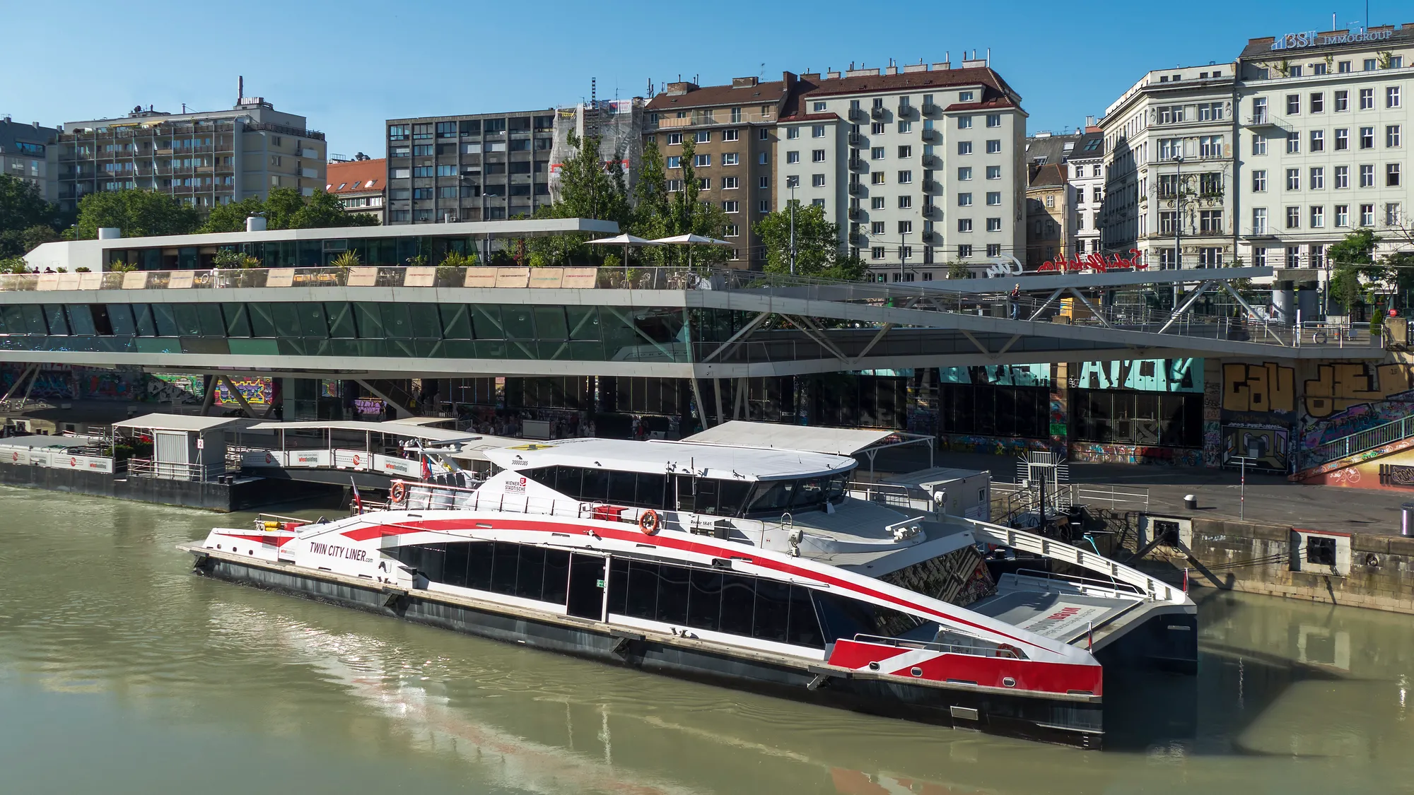 The Twin City Liner catamaran moored at the Schwedenplatz quay on the Danube Canal in Vienna