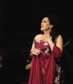 Anna Ryan, soprano, singing with the orchestra.
