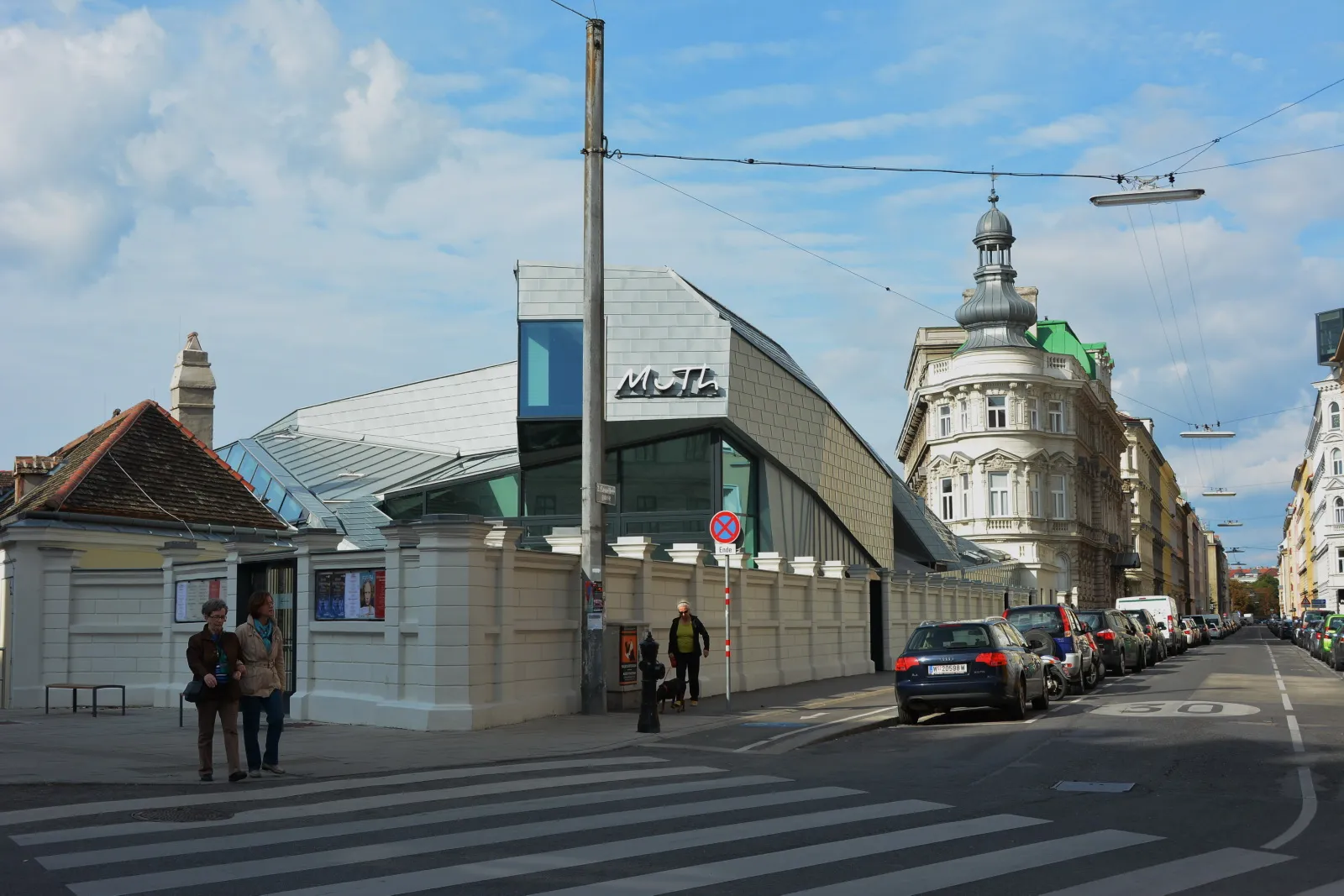 The MuTh at the edge of the Augarten: the silver-clad hall and its name above the entrance.