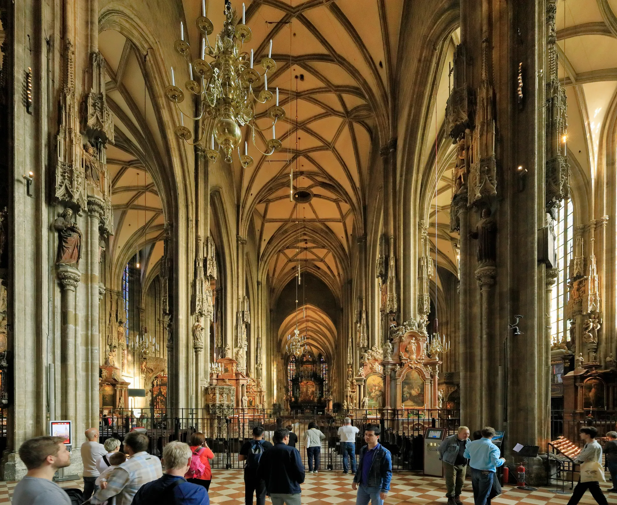 The Gothic nave of St Stephen’s Cathedral, its vault rising over the pews to the high altar.