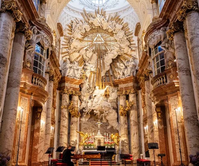 The Baroque interior of the Karlskirche: the stucco of the high altar beneath the dome.